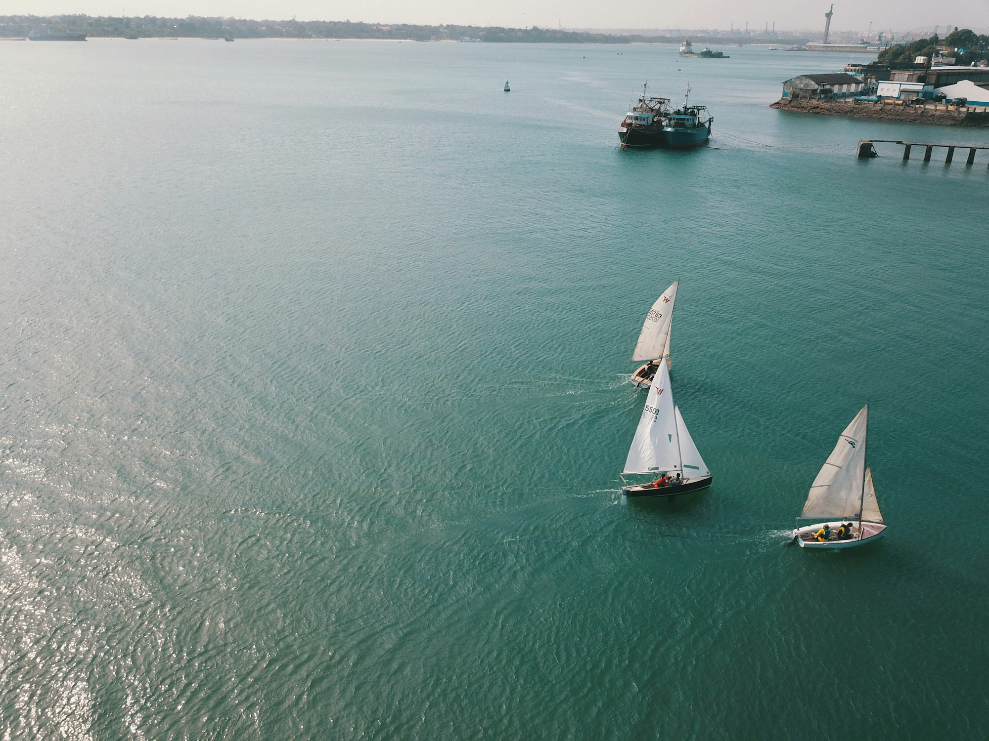 Sailing dhows off the coast at Mombasa, Kenya